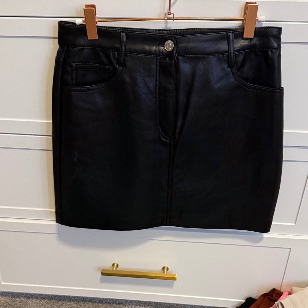 Brand New with tags Sleek Black Mini Skirt
